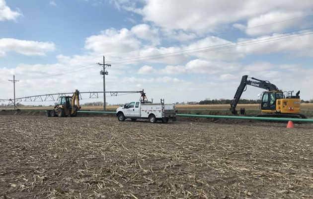 A natural gas crew installs a new natural gas pipeline.